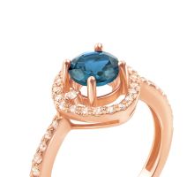 Золотое кольцо с топазом и фианитами (530049/01/0/5476): купить